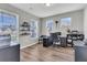 Comfortable home office with natural light, hardwood floors, and ample space for work and storage at 106 Lakelyn Rd, Moncks Corner, SC 29461