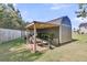 Open storage shed featuring a trailer, wooden supports and covered roof at 106 Lakelyn Rd, Moncks Corner, SC 29461