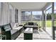 Sunroom featuring comfortable seating and lots of natural light and views of the backyard at 106 Lakelyn Rd, Moncks Corner, SC 29461