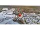 Aerial view with pin of a serene waterfront community with lush landscapes and winding waterways at 1063 Hills Plantation Dr, Charleston, SC 29412