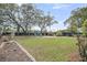 Green backyard featuring a firepit, perfect for outdoor gatherings at 1063 Hills Plantation Dr, Charleston, SC 29412