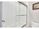 Modern bathroom with white subway tile and glass shower door at 1063 Hills Plantation Dr, Charleston, SC 29412