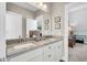 Bathroom featuring double sinks with granite countertop and shaker cabinets at 1063 Hills Plantation Dr, Charleston, SC 29412