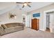 Comfortable bedroom features a couch, dresser and neutral carpet creating a relaxing space at 1063 Hills Plantation Dr, Charleston, SC 29412