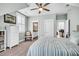This bedroom features an ensuite bathroom, a tall dresser, and room for musical expression at 1063 Hills Plantation Dr, Charleston, SC 29412