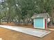 Bocce ball court and picnic tables surrounded by mature trees offer outdoor fun at 1063 Hills Plantation Dr, Charleston, SC 29412