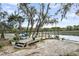 Waterfront dock with lounge area, offering a relaxing spot by the water at 1063 Hills Plantation Dr, Charleston, SC 29412