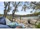 Waterfront dock featuring comfortable seating, perfect for enjoying the scenic views at 1063 Hills Plantation Dr, Charleston, SC 29412