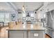 Gourmet kitchen with granite island, modern appliances, and custom cabinetry at 1063 Hills Plantation Dr, Charleston, SC 29412
