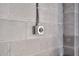 Close-up of a three-prong electrical outlet on a concrete block wall at 1063 Hills Plantation Dr, Charleston, SC 29412