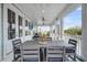 Spacious porch with dining and lounging areas, offering a versatile outdoor living space at 1063 Hills Plantation Dr, Charleston, SC 29412