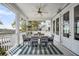 Inviting porch featuring a dining table and seating, perfect for enjoying outdoor meals at 1063 Hills Plantation Dr, Charleston, SC 29412