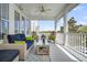 Relaxing porch with comfortable seating and a view of the surrounding landscape at 1063 Hills Plantation Dr, Charleston, SC 29412