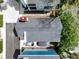 Aerial view showing roof, parking and surrounding landscaping of this home at 108 Smith St # 108-I, Charleston, SC 29403