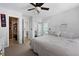 Comfortable bedroom with neutral tones, carpet flooring, and a view of the bathroom at 108 Smith St # 108-I, Charleston, SC 29403