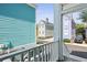 View of colorful homes from a porch, showcasing a vibrant neighborhood setting at 108 Smith St # 108-I, Charleston, SC 29403
