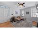 Bright living room with a comfortable sofa, decorative artwork, and natural light at 108 Smith St # 108-I, Charleston, SC 29403