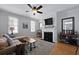 Cozy living room featuring a fireplace, plush sofa, and warm, inviting decor at 108 Smith St # 108-I, Charleston, SC 29403