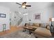 Inviting living room featuring a staircase, comfortable seating, and stylish decor at 108 Smith St # 108-I, Charleston, SC 29403