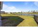 Spacious backyard with a fence and a serene lake view, perfect for outdoor enjoyment at 110 Haverhill St, Summerville, SC 29486