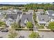 A beautiful aerial view of the suburban neighborhood with well-maintained homes and yards at 113 Sugarberry Way, Summerville, SC 29485