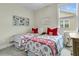 Cozy bedroom with two beds, perfect for Gathering or guests, featuring bright natural light at 113 Sugarberry Way, Summerville, SC 29485