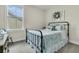 Charming bedroom with a decorative bed frame, bright window, and pleasant natural light at 113 Sugarberry Way, Summerville, SC 29485