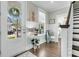 Inviting foyer featuring hardwood floors, charming decor, and a warm welcome at 113 Sugarberry Way, Summerville, SC 29485