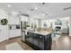 Modern kitchen featuring a large island, stainless steel appliances, and an open layout at 113 Sugarberry Way, Summerville, SC 29485