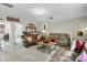 Relax in this spacious living room featuring comfortable leather sofas and a cozy atmosphere at 113 Sugarberry Way, Summerville, SC 29485
