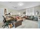 Bright living room featuring lots of natural light and modern furniture for relaxation and comfort at 113 Sugarberry Way, Summerville, SC 29485