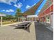 Outdoor dining area showcasing picnic tables, pergolas, and shade sails for comfortable gatherings at 113 Sugarberry Way, Summerville, SC 29485