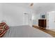 Bedroom featuring a wood dresser, hardwood floors, and soft light at 1130 5Th Ave, Charleston, SC 29407