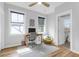 Bedroom with a desk and rolling office chair near a window, and a yellow saucer chair at 1130 5Th Ave, Charleston, SC 29407