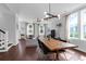 Inviting living space with hardwood floors, abundant natural light, modern lighting, and an open concept design at 1130 5Th Ave, Charleston, SC 29407