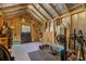 Shed interior used for exercise equipment with weights and bikes at 1157 King St, Charleston, SC 29403