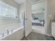 Bathroom with a separate bathtub and shower, offering a relaxing spa-like experience at 120 Indigo Marsh Cir, Wando, SC 29492