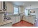 Modern kitchen featuring granite counters, stainless appliances, and an adjacent dining nook at 120 Indigo Marsh Cir, Wando, SC 29492