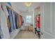 Spacious walk-in closet offers ample storage with built-in shelving and hanging rods at 120 Indigo Marsh Cir, Wando, SC 29492