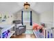 Cozy Bedroom room with a crib, a glider, a changing table, and a window with neutral decor at 123 Dasharon Ln, Goose Creek, SC 29445