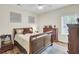 Comfortable bedroom with wood furniture, a ceiling fan, and a window at 123 Dasharon Ln, Goose Creek, SC 29445