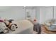 This is a bedroom with light blue walls, white trim, carpet, lots of pillows and a white chair at 123 Dasharon Ln, Goose Creek, SC 29445