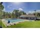 Community pool area with ample deck space, lounge chairs, and well-kept grounds at 123 Dasharon Ln, Goose Creek, SC 29445