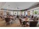 Inviting dining area with wood accents, comfortable chairs, and ample seating at 123 Dasharon Ln, Goose Creek, SC 29445