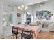 Dining room with sliding doors to the back porch that is open to the living room at 123 Dasharon Ln, Goose Creek, SC 29445