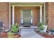 Charming front entrance with brick columns, and landscaping at 123 Dasharon Ln, Goose Creek, SC 29445