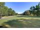 Lush green golf course featuring a scenic pathway and mature trees at 123 Dasharon Ln, Goose Creek, SC 29445
