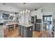 Spacious open kitchen with stainless steel appliances, light countertops, and an island at 123 Dasharon Ln, Goose Creek, SC 29445