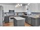Well-lit kitchen featuring two-tone cabinets, stainless steel appliances, and a center island at 123 Dasharon Ln, Goose Creek, SC 29445