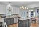 Kitchen is open to dining and living rooms and features an island and stainless steel appliances at 123 Dasharon Ln, Goose Creek, SC 29445